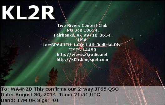 QSL card we received from KL2R in Fairbanks, Alaska, showing their hex beam at night (with aurora).